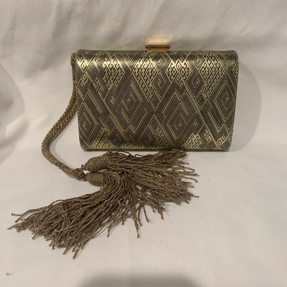 Escada Handbags - Escada gold evening clutch barely worn vintage
